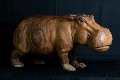 Product image of the product “Hippopotamus, carved from Suar Wood. In the sizes from 80 to 100cm. ”